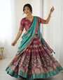 Wine & Teal Kalamkari Tussar Silk Lehenga with Zari Border & Tassel Dupatta – Festive & Wedding Wear