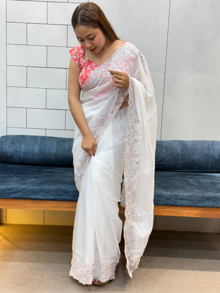 Elegant White tabby Organza Saree with Pastel Floral Embroidery & Pink Printed Blouse