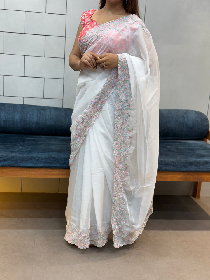 Elegant White tabby Organza Saree with Pastel Floral Embroidery & Pink Printed Blouse