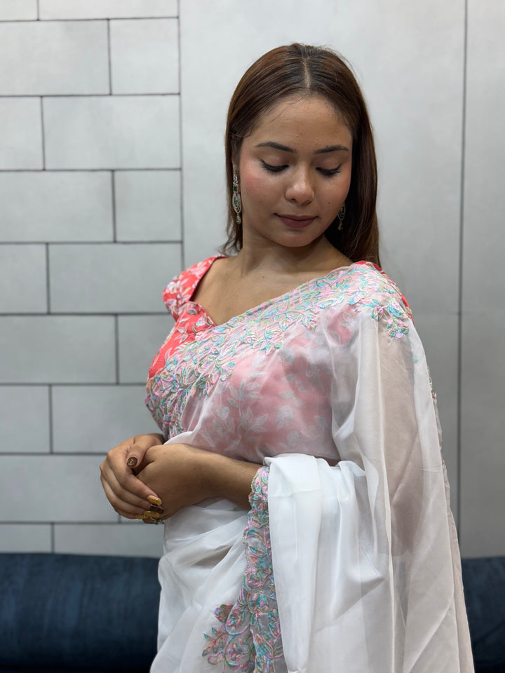 Elegant White tabby Organza Saree with Pastel Floral Embroidery & Pink Printed Blouse