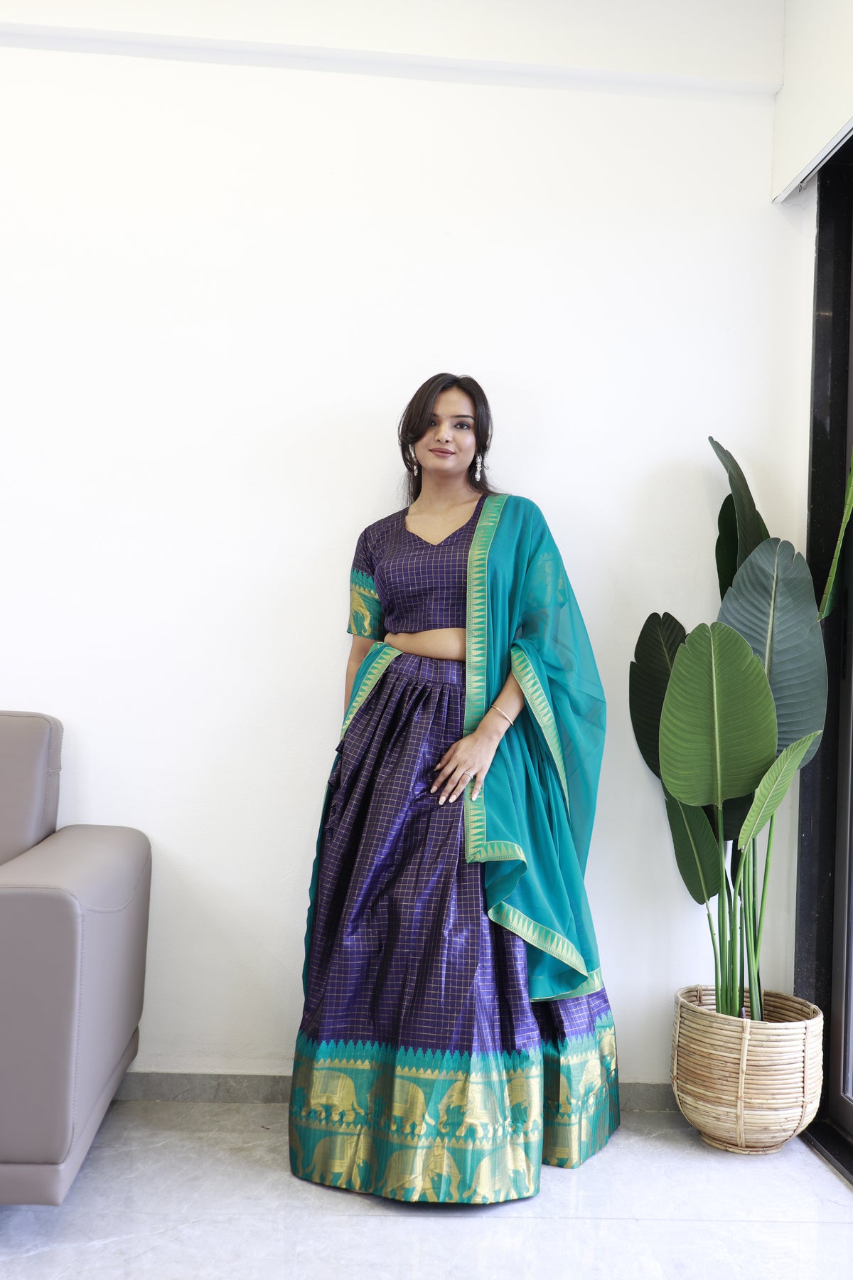 Elegant elephant blue checks silk lehenga, light shades to complement to create beautiful aura in all function