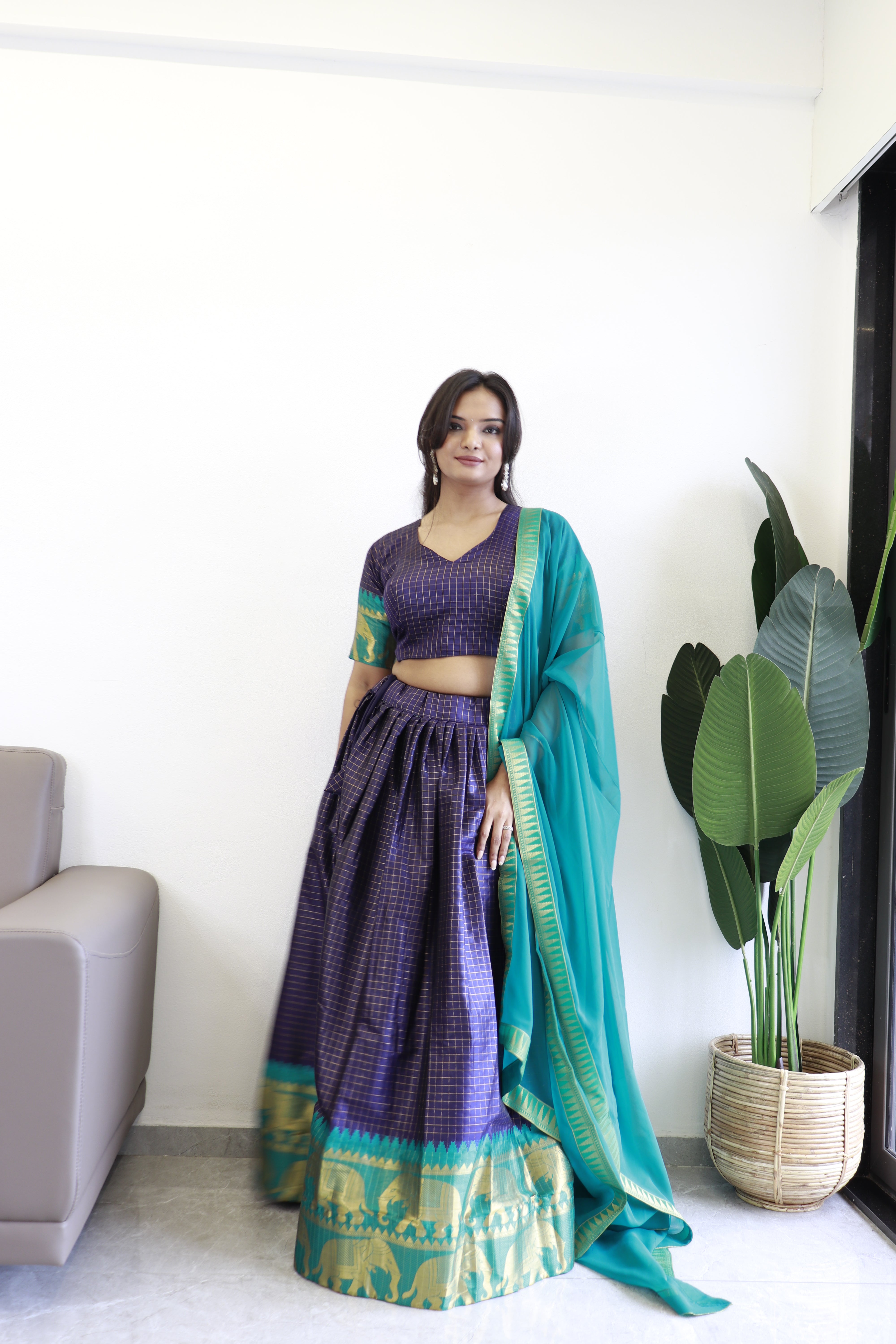 Elegant elephant blue checks silk lehenga, light shades to complement to create beautiful aura in all function