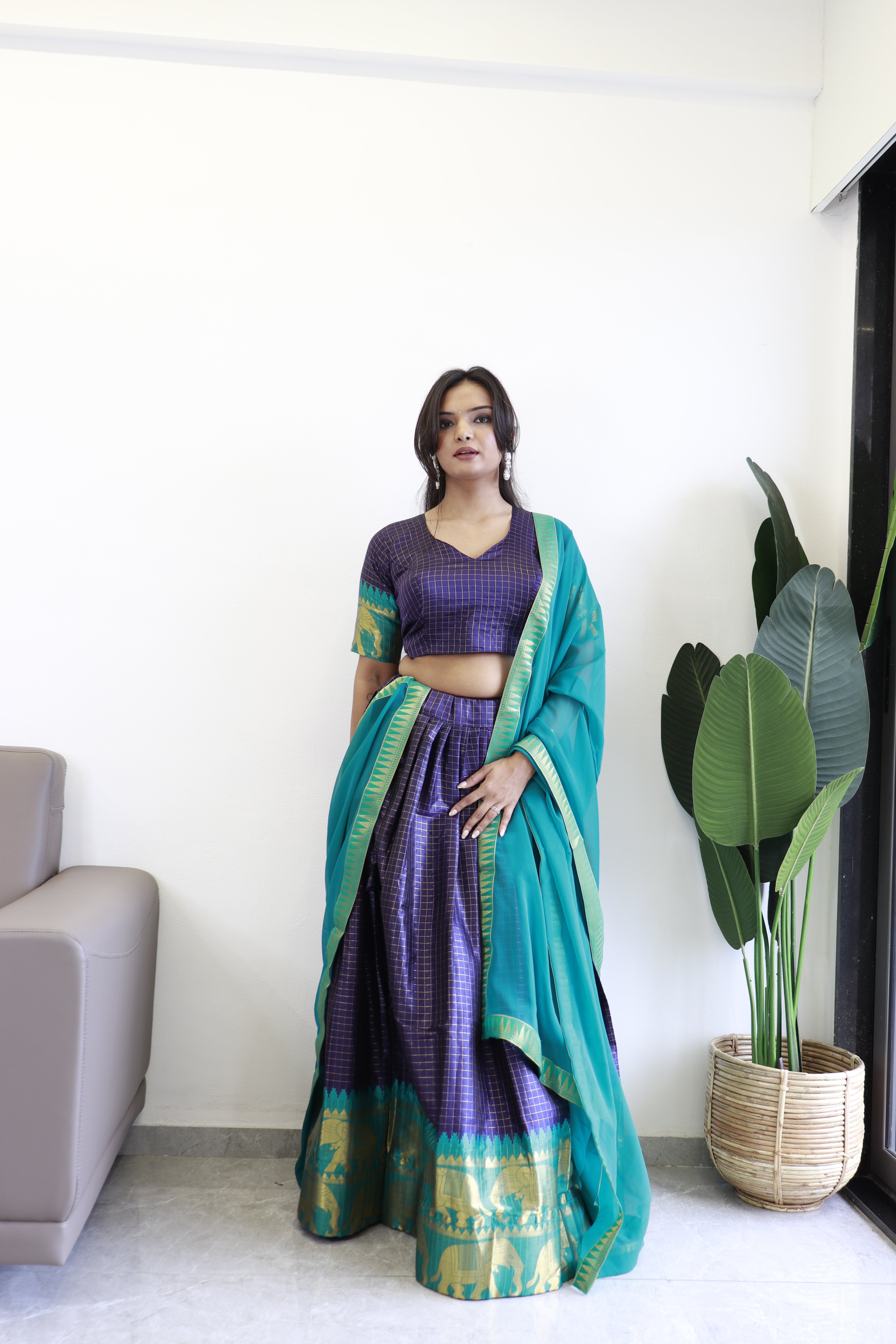 Elegant elephant blue checks silk lehenga, light shades to complement to create beautiful aura in all function