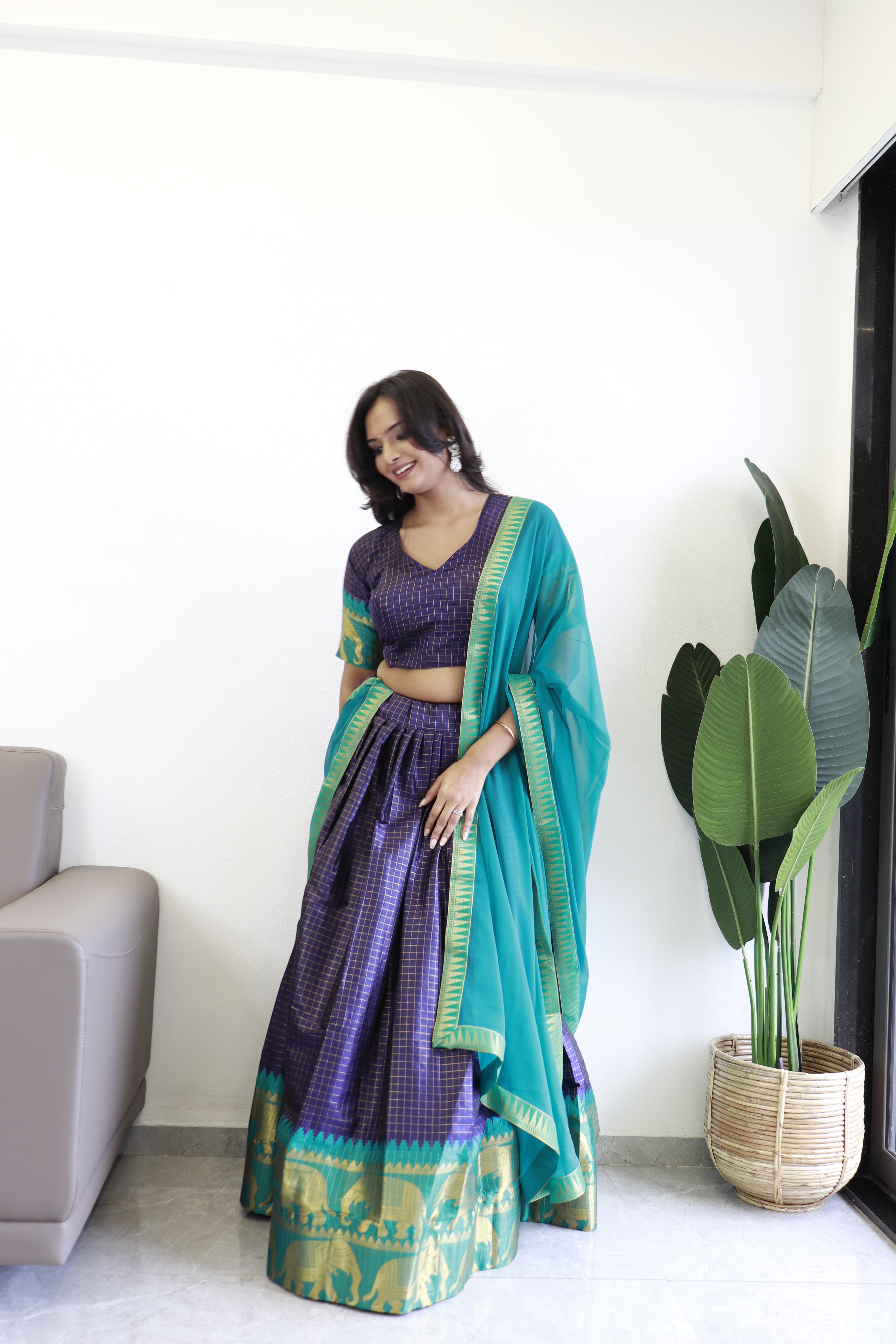 Elegant elephant blue checks silk lehenga, light shades to complement to create beautiful aura in all function