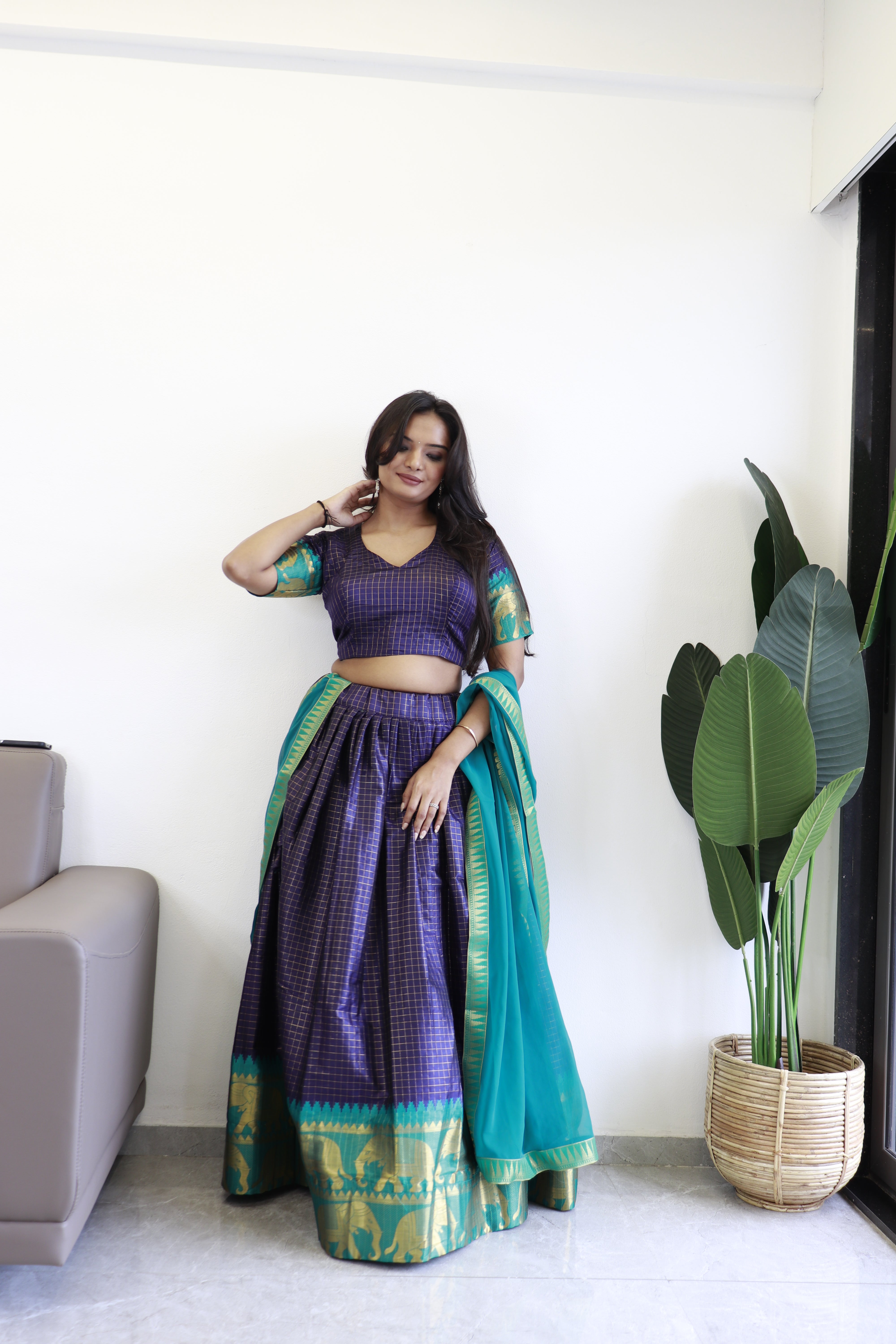 Elegant elephant blue checks silk lehenga, light shades to complement to create beautiful aura in all function