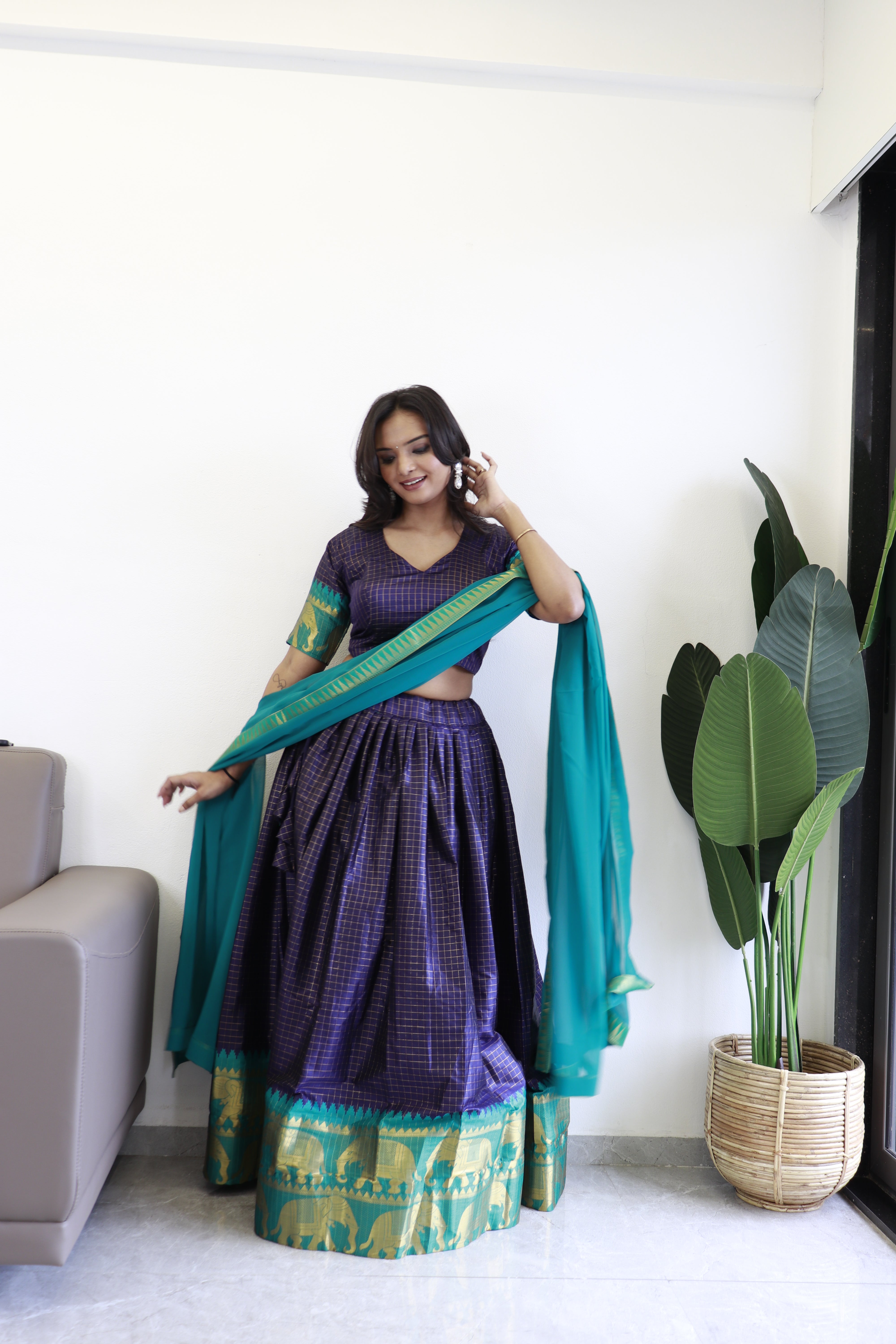 Elegant elephant blue checks silk lehenga, light shades to complement to create beautiful aura in all function