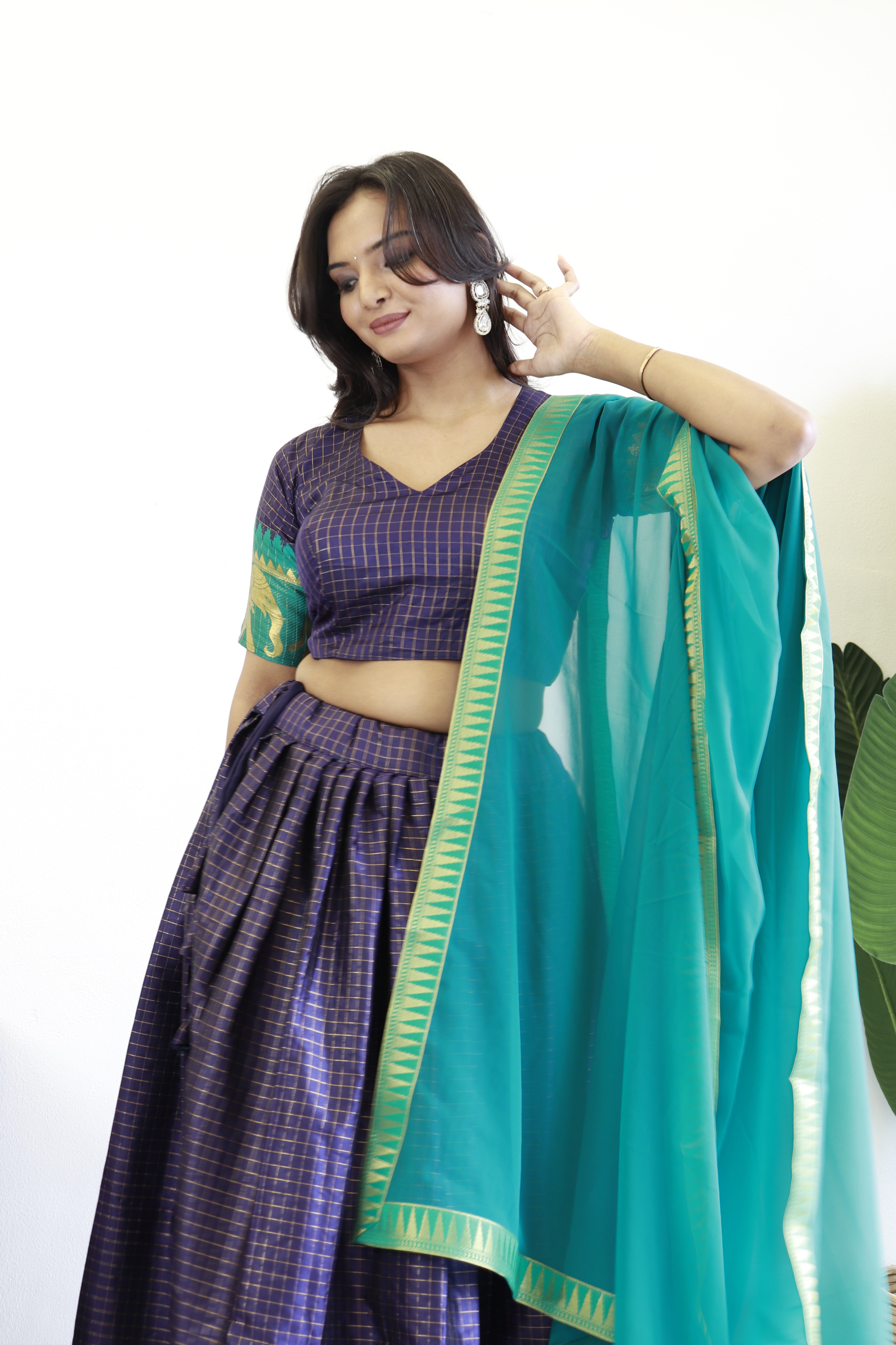 Elegant elephant blue checks silk lehenga, light shades to complement to create beautiful aura in all function