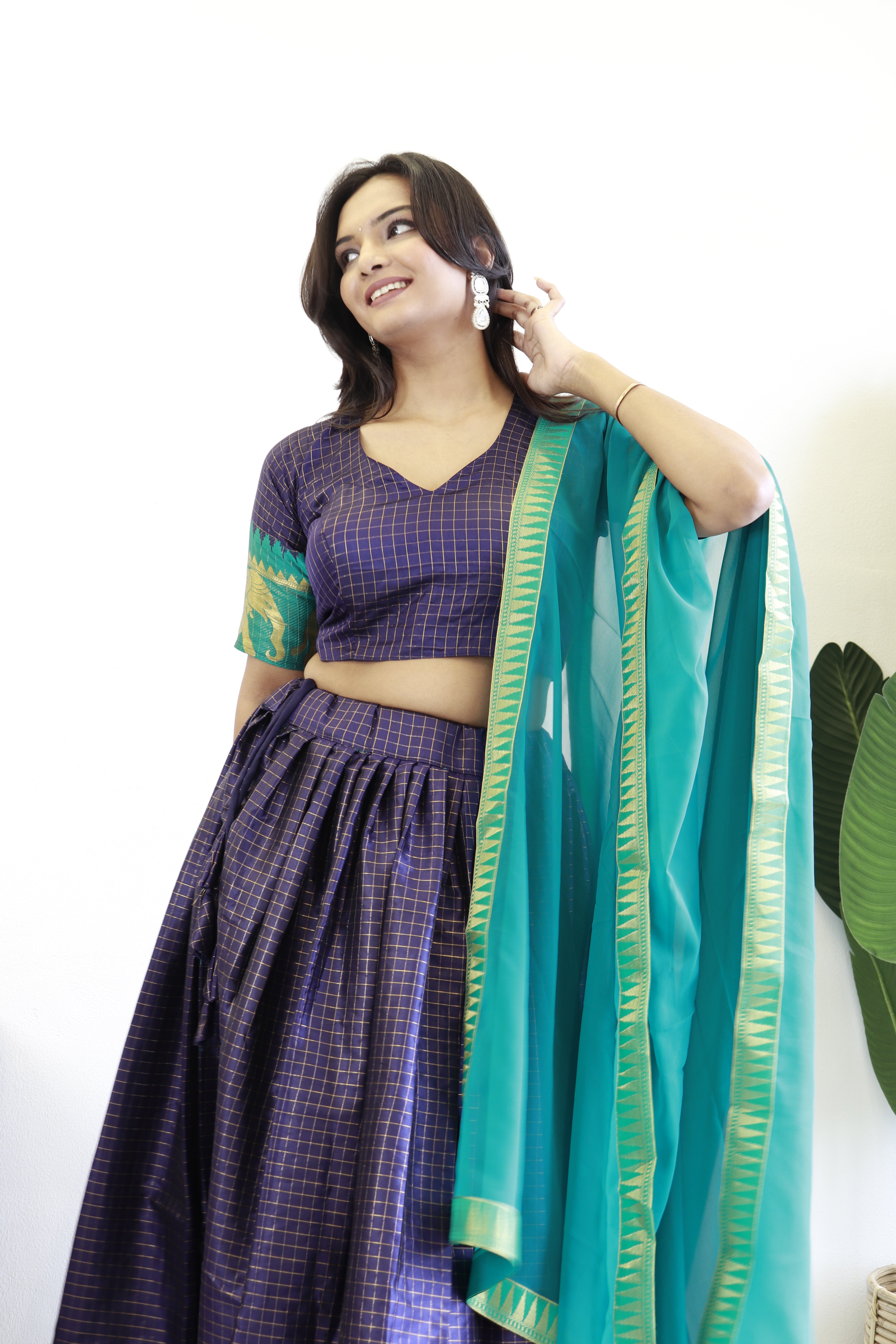 Elegant elephant blue checks silk lehenga, light shades to complement to create beautiful aura in all function