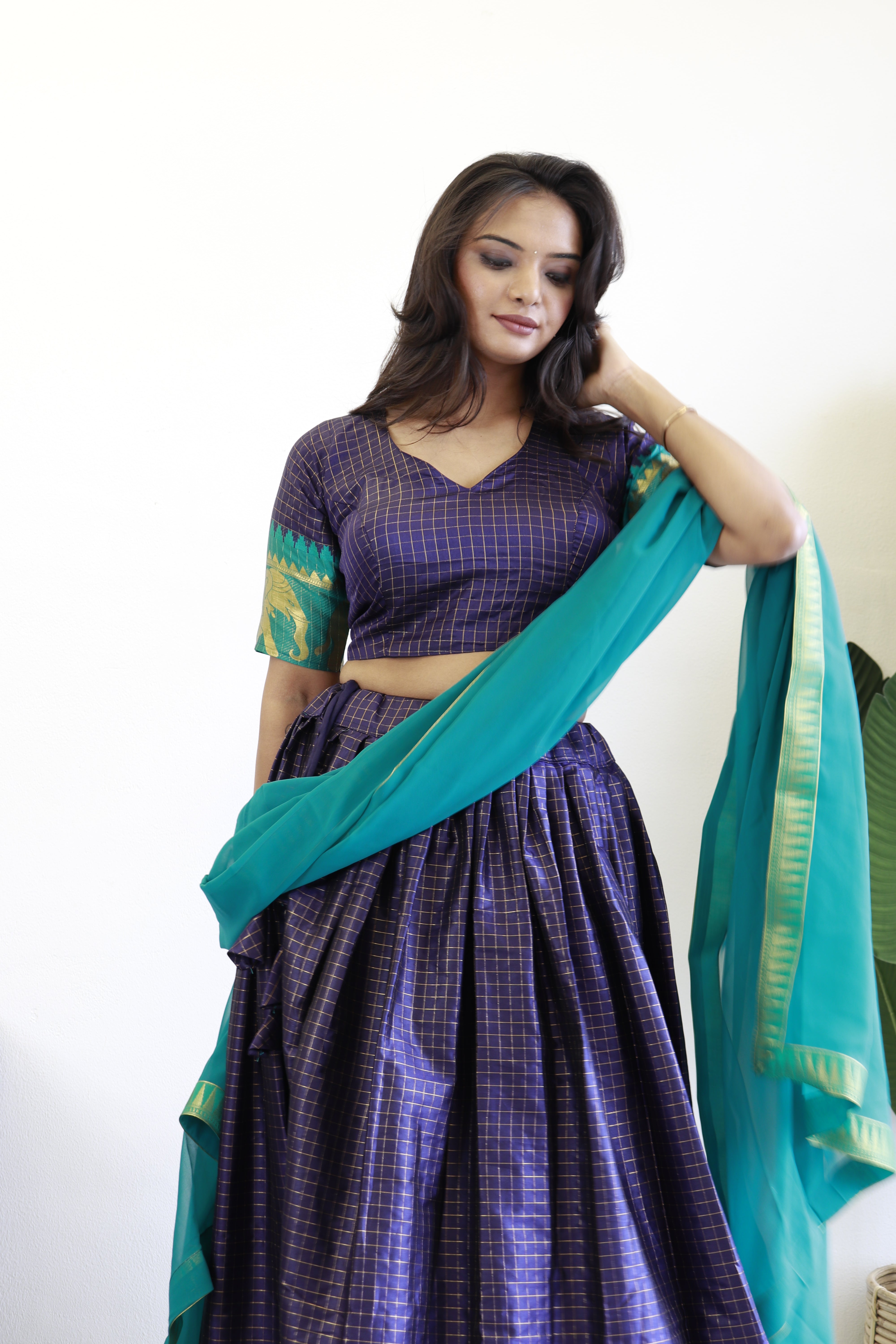 Elegant elephant blue checks silk lehenga, light shades to complement to create beautiful aura in all function