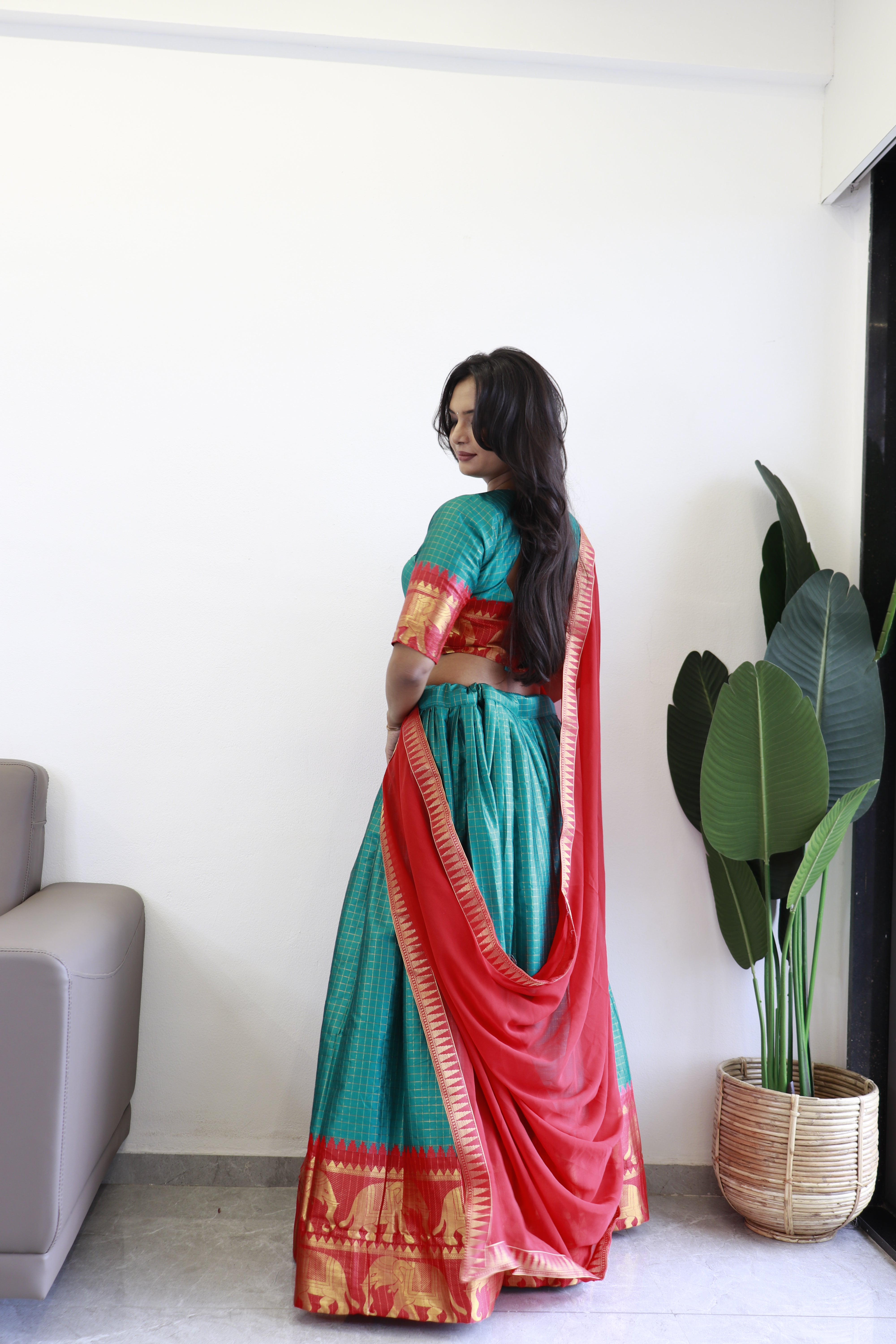 Elegant elephant green checks silk lehenga, light shades to complement to create beautiful aura in all function