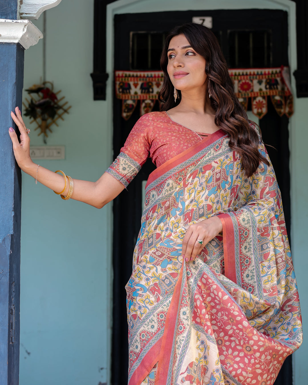 Rust Beige Handloom Cotton Saree with Vibrant Elephant Parade Print & Red Floral Pallu