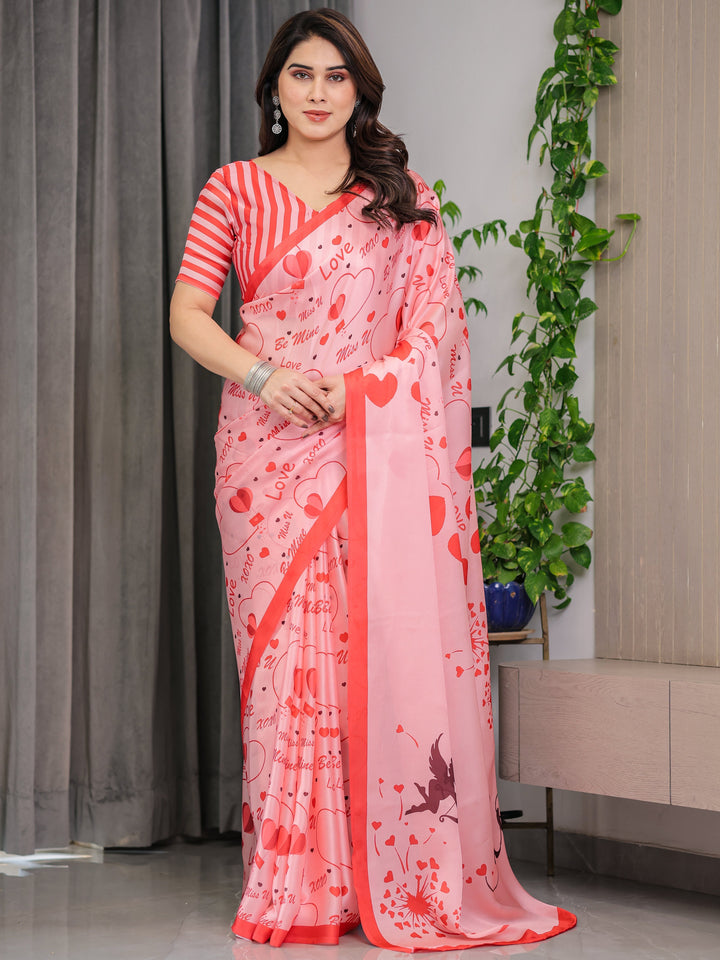 Blush Pink & Coral Red Heart Print Satin Georgette Saree with Romantic Love Typography Pallu and Attached Striped Blouse – 5.5 Meter Designer Saree for Valentine’s Day & Anniversary Wear