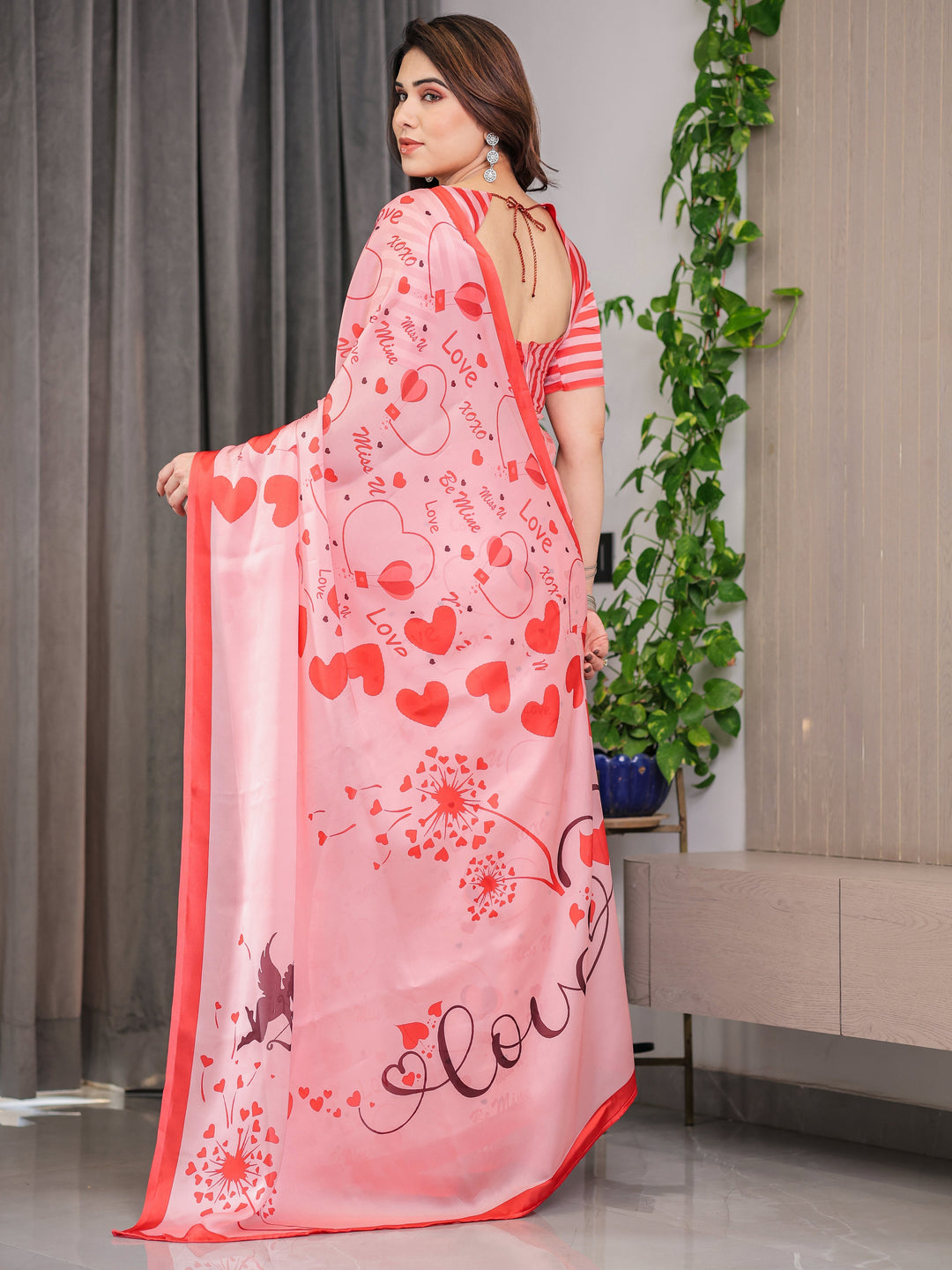 Blush Pink & Coral Red Heart Print Satin Georgette Saree with Romantic Love Typography Pallu and Attached Striped Blouse – 5.5 Meter Designer Saree for Valentine’s Day & Anniversary Wear
