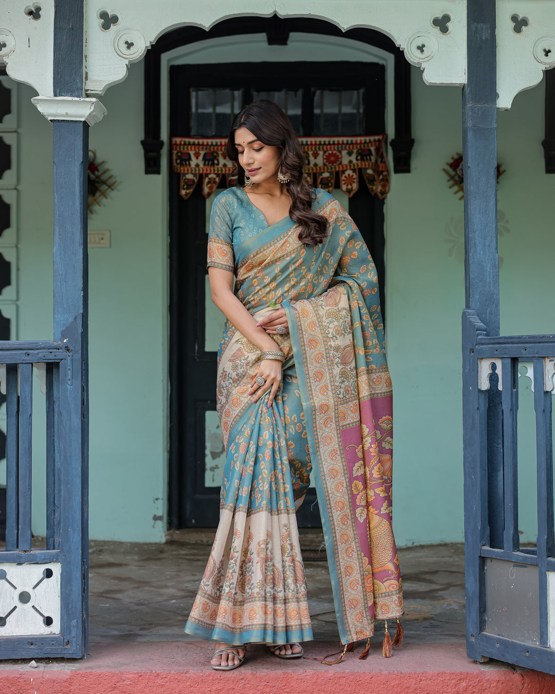 Turquoise Blue Handloom Cotton Saree with Multicolor Floral Pallu & Peach Border