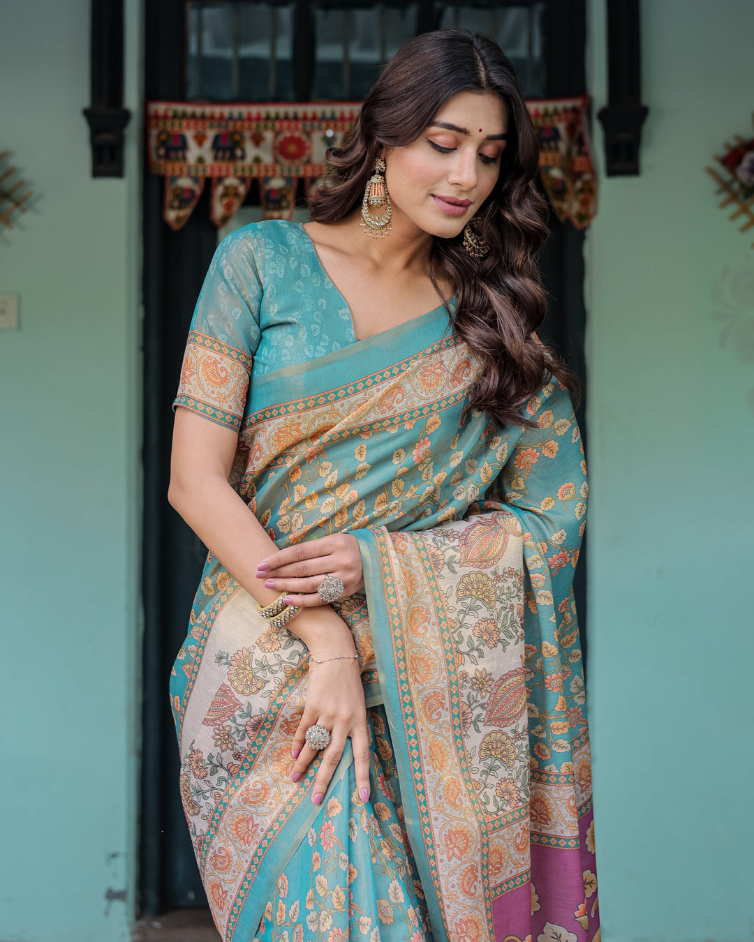 Turquoise Blue Handloom Cotton Saree with Multicolor Floral Pallu & Peach Border