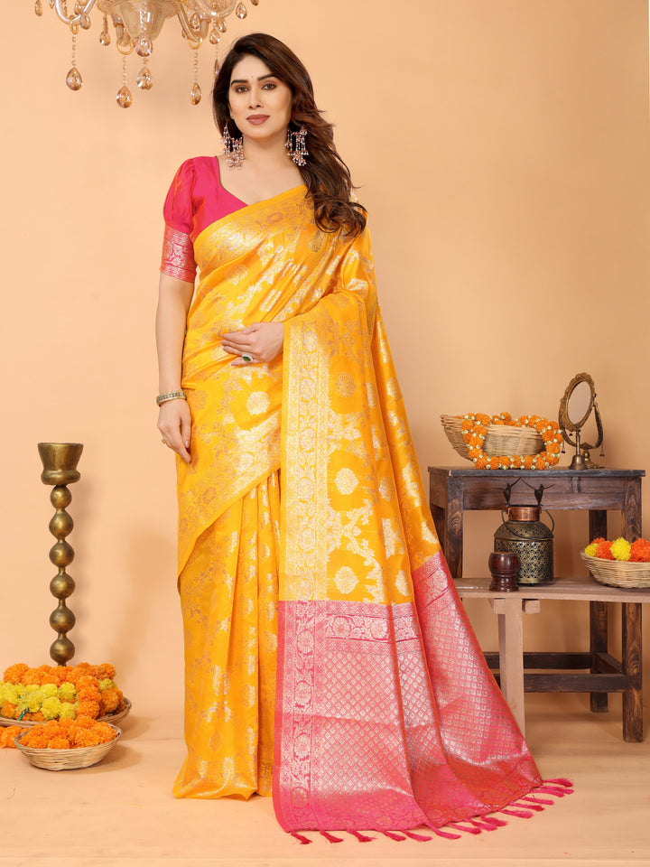 Traditional Yellow Banarasi Silk Saree with Pink Zari Border and Blouse – Festive Traditional Wear