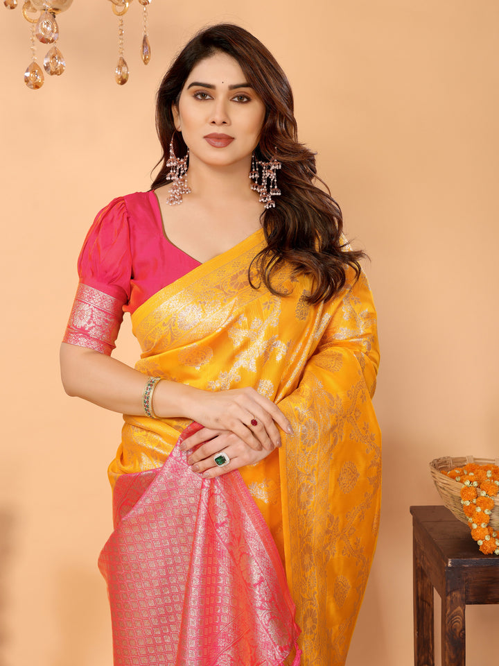Traditional Yellow Banarasi Silk Saree with Pink Zari Border and Blouse – Festive Traditional Wear