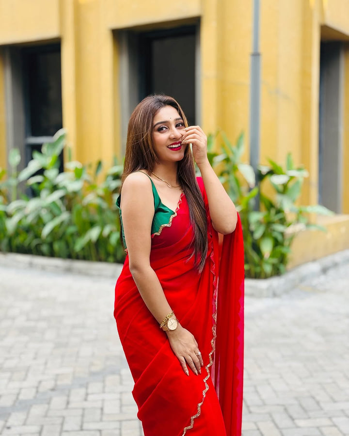 Elegant Red Saree with Golden Handwork Border & Green Blouse – Festive & Party Wear