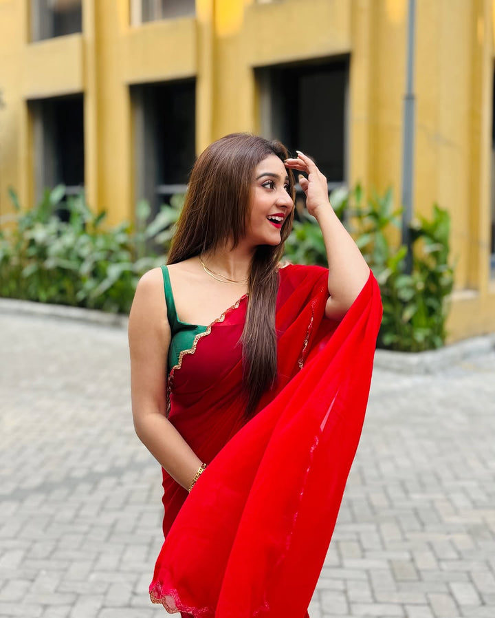 Elegant Red Saree with Golden Handwork Border & Green Blouse – Festive & Party Wear