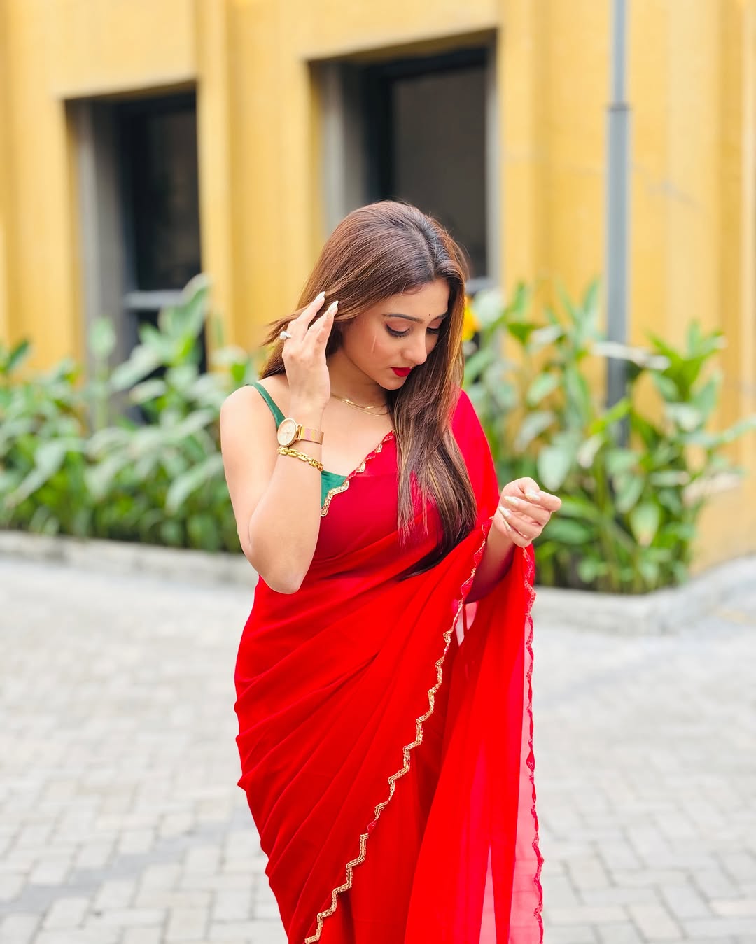 Elegant Red Saree with Golden Handwork Border & Green Blouse – Festive & Party Wear