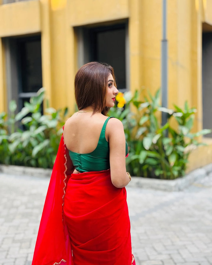 Elegant Red Saree with Golden Handwork Border & Green Blouse – Festive & Party Wear