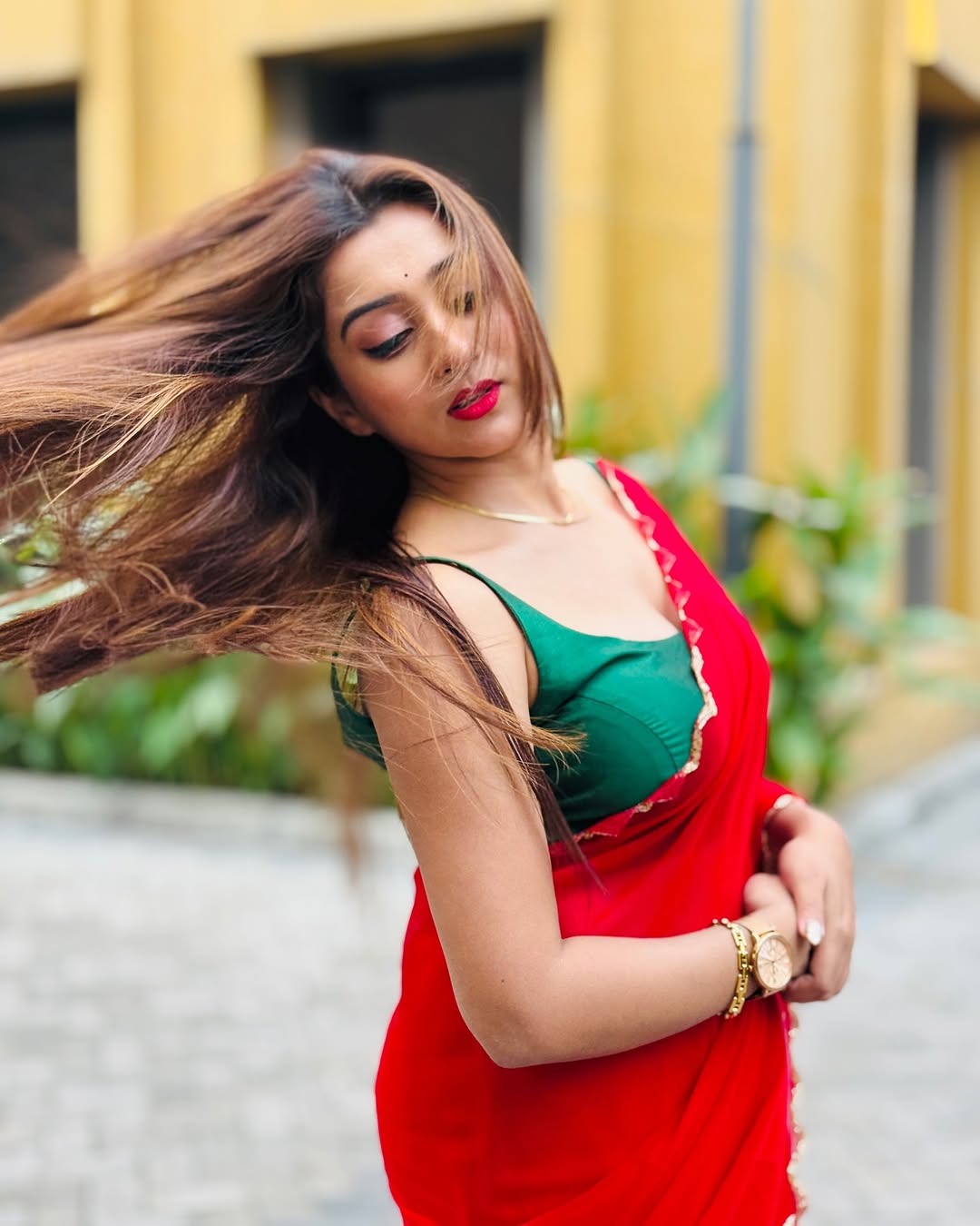 Elegant Red Saree with Golden Handwork Border & Green Blouse – Festive & Party Wear