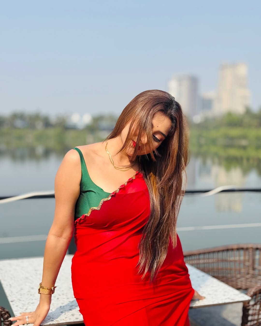 Elegant Red Saree with Golden Handwork Border & Green Blouse – Festive & Party Wear