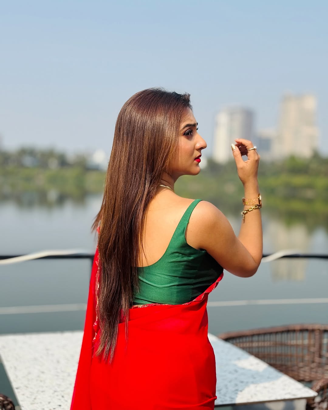 Elegant Red Saree with Golden Handwork Border & Green Blouse – Festive & Party Wear