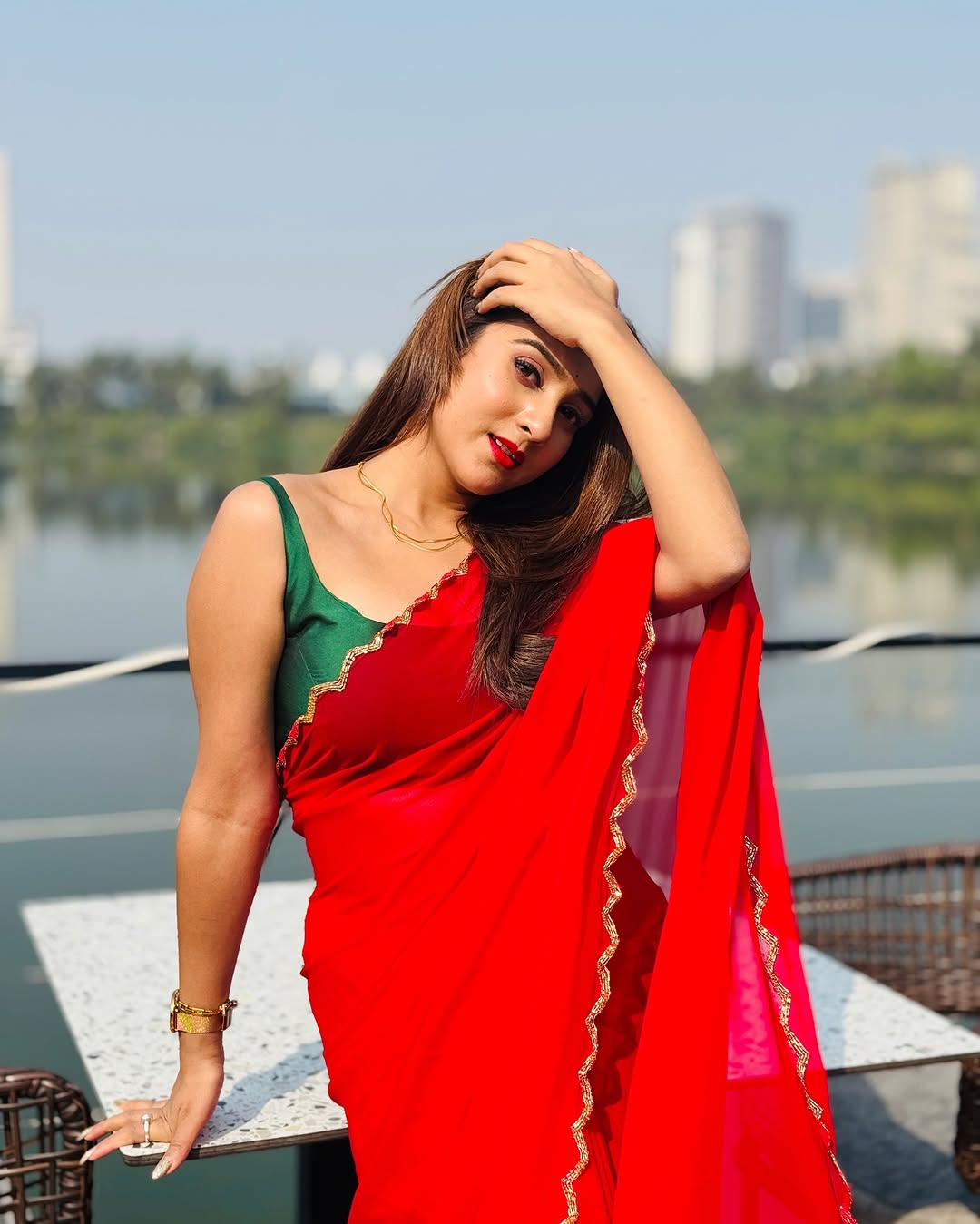Elegant Red Saree with Golden Handwork Border & Green Blouse – Festive & Party Wear