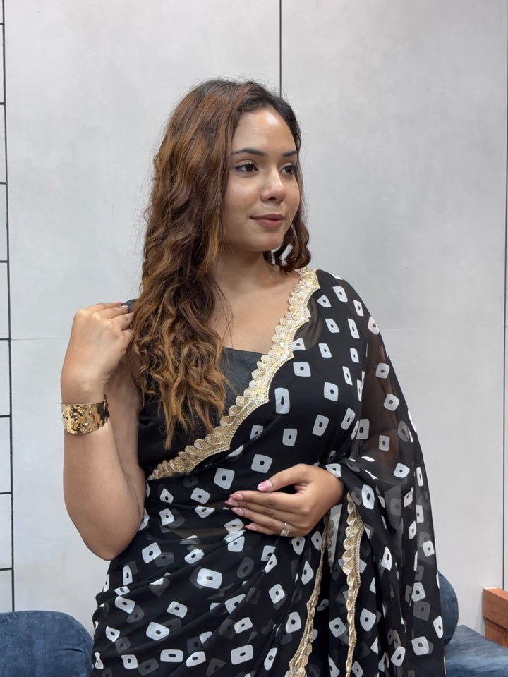 Elegant Black Bandhani Georgette Saree with embroidery Lace Border & Running Blouse