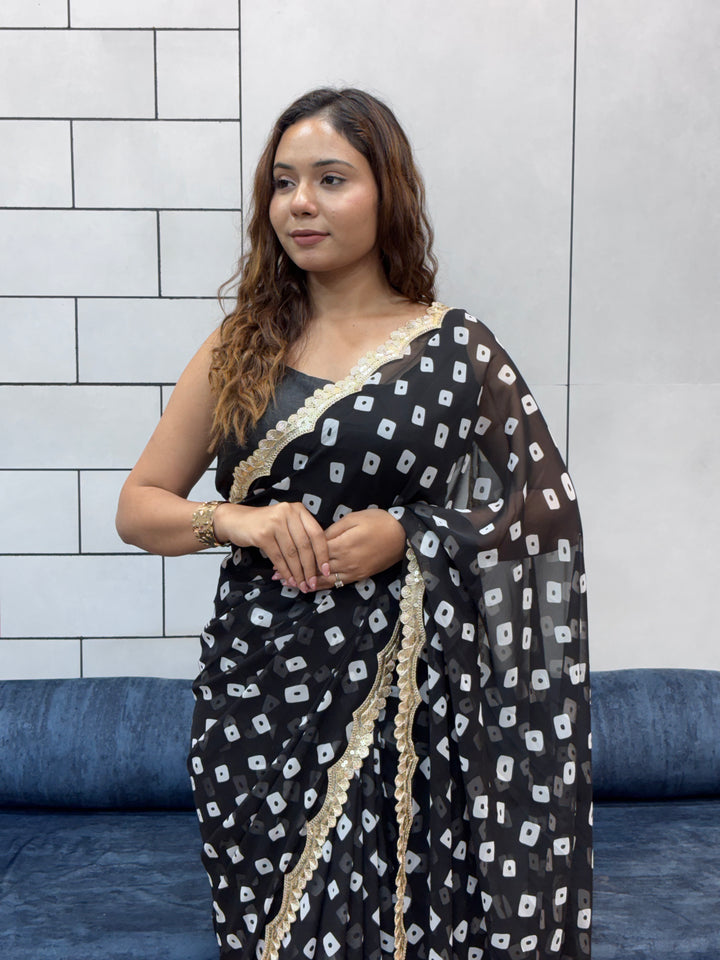 Elegant Black Bandhani Georgette Saree with embroidery Lace Border & Running Blouse