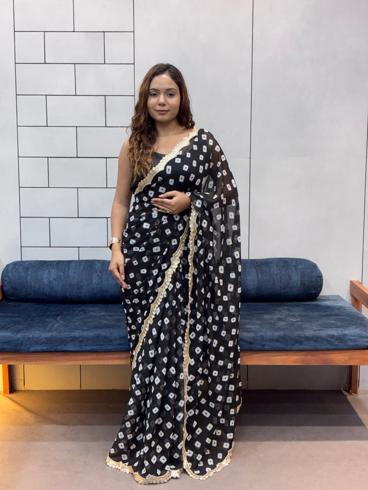Elegant Black Bandhani Georgette Saree with embroidery Lace Border & Running Blouse