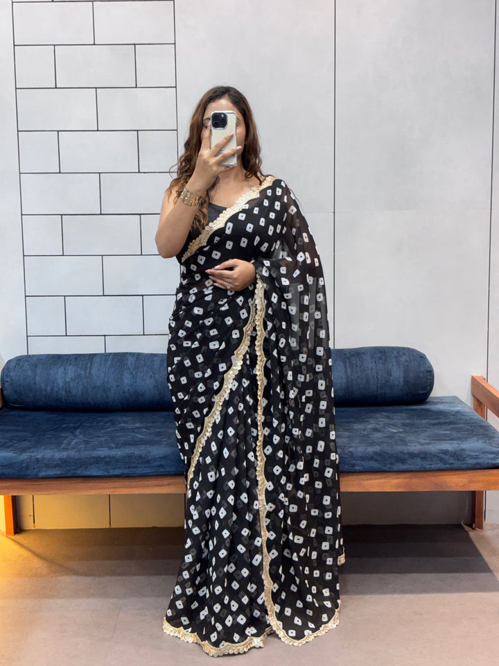 Elegant Black Bandhani Georgette Saree with embroidery Lace Border & Running Blouse