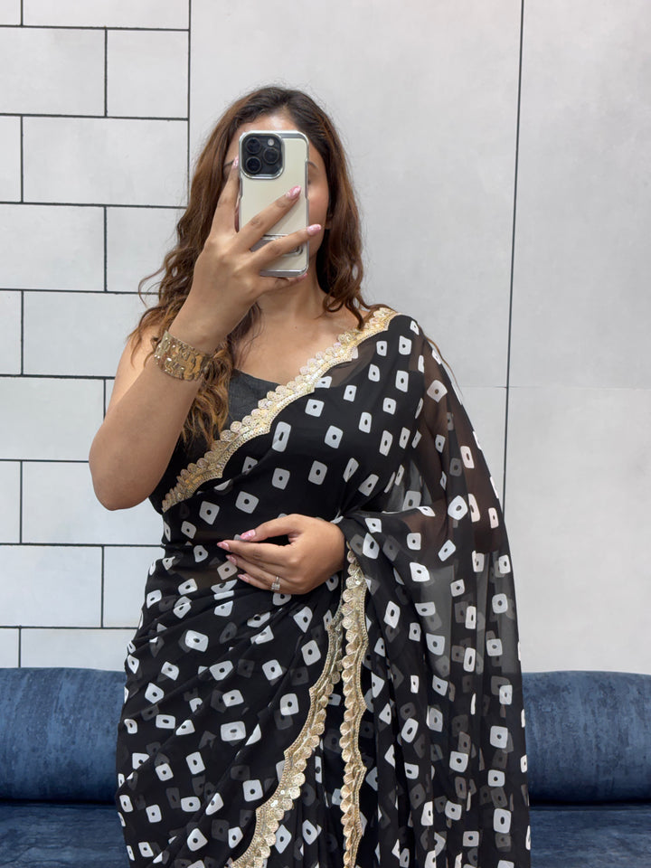 Elegant Black Bandhani Georgette Saree with embroidery Lace Border & Running Blouse