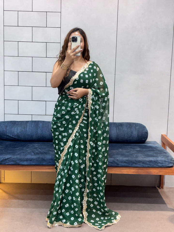 Emerald Green Bandhani Georgette Saree with embroidery Lace Border & Running Blouse