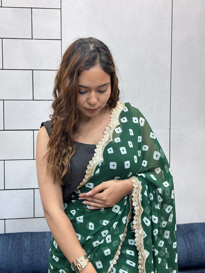 Emerald Green Bandhani Georgette Saree with embroidery Lace Border & Running Blouse