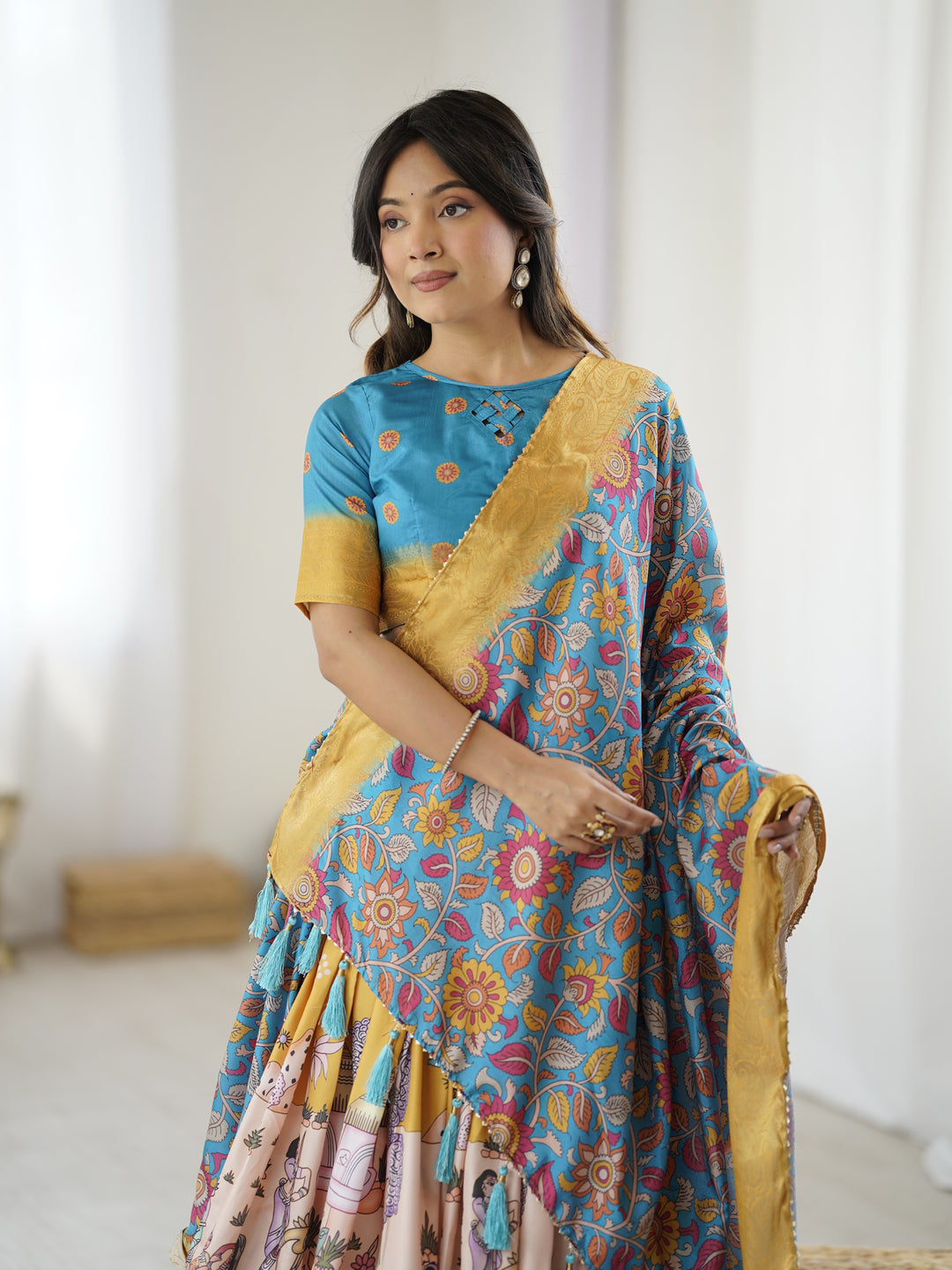Elegant Kalamkari Lehenga in Blue and Peach with Floral Dupatta and Flared Skirt