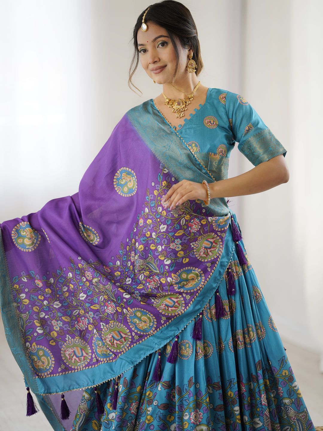 Turquoise Blue & Purple Kalamkari Tussar Silk Lehenga with Zari Border & Tassel Dupatta – Wedding & Festive Wear