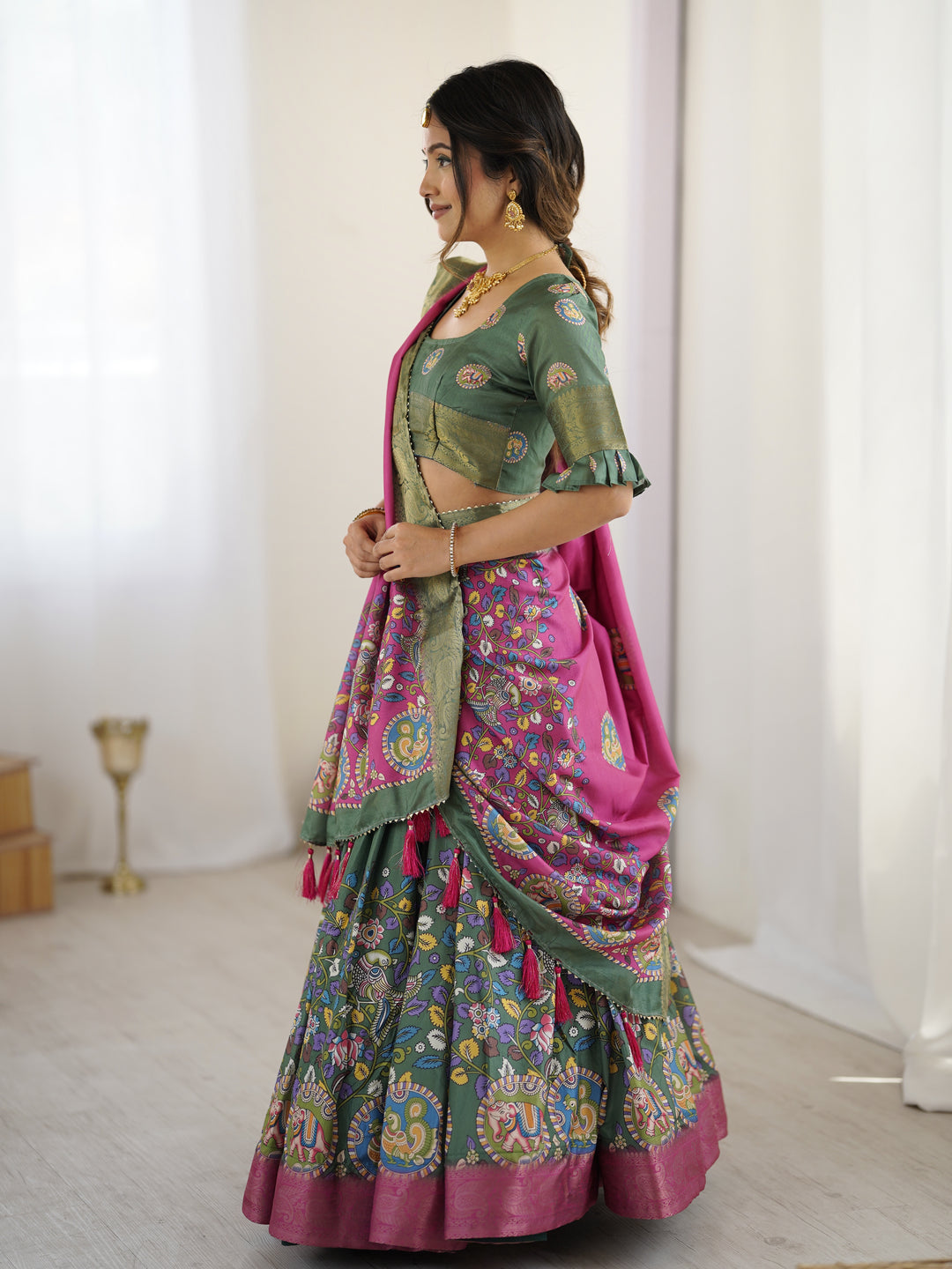 Green & Pink Kalamkari Tussar Silk Lehenga with Zari Border & Tassel Dupatta – Festive & Wedding Wear