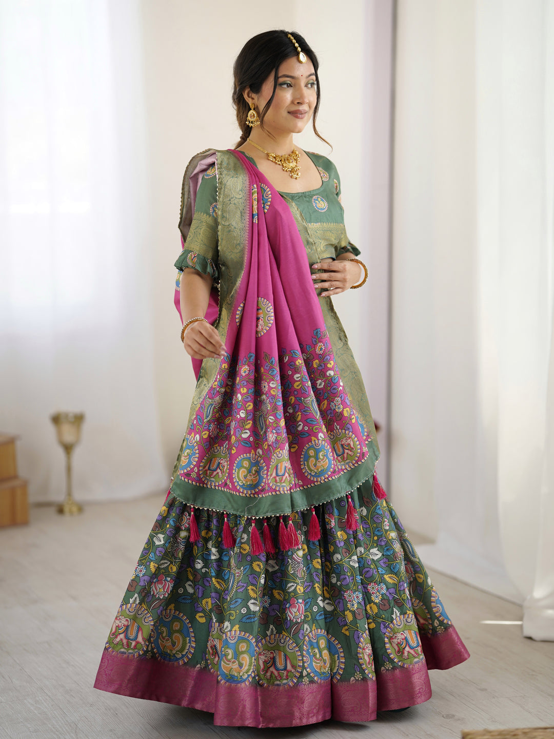 Green & Pink Kalamkari Tussar Silk Lehenga with Zari Border & Tassel Dupatta – Festive & Wedding Wear