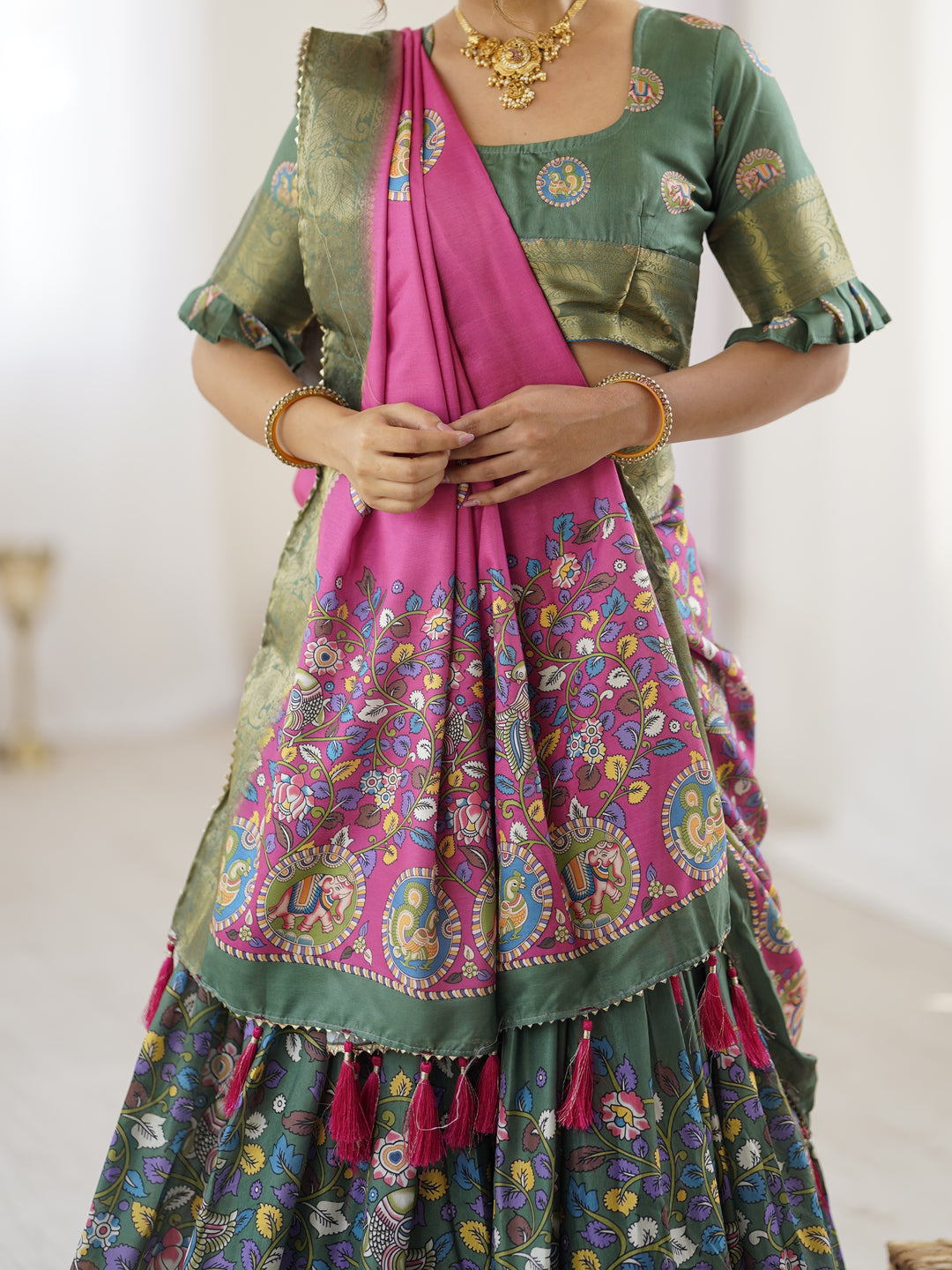 Green & Pink Kalamkari Tussar Silk Lehenga with Zari Border & Tassel Dupatta – Festive & Wedding Wear