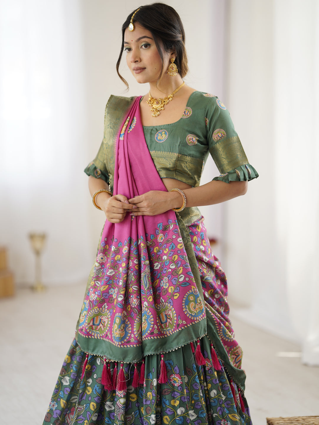 Green & Pink Kalamkari Tussar Silk Lehenga with Zari Border & Tassel Dupatta – Festive & Wedding Wear