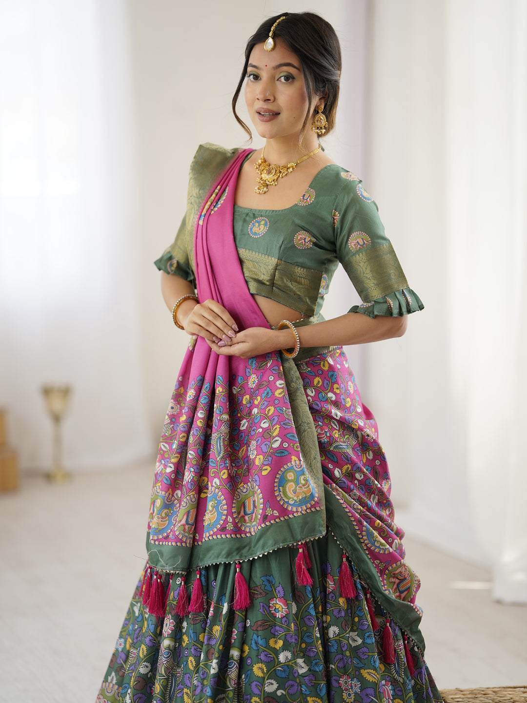 Green & Pink Kalamkari Tussar Silk Lehenga with Zari Border & Tassel Dupatta – Festive & Wedding Wear