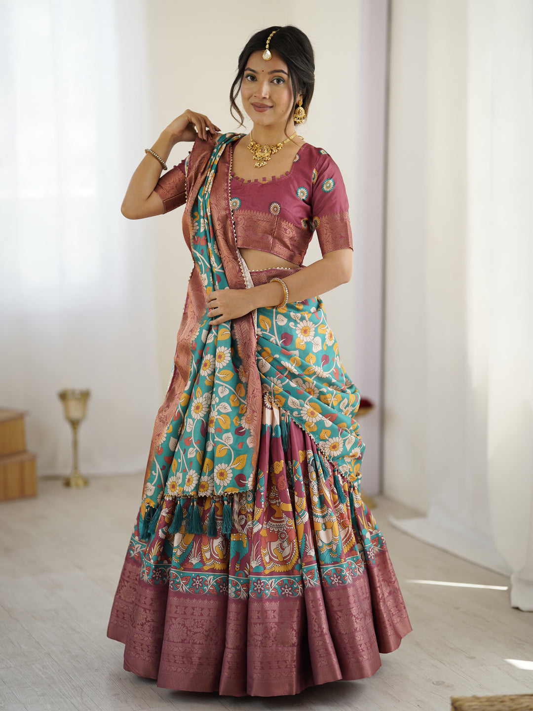 Wine & Turquoise Kalamkari Tussar Silk Lehenga with Floral Motifs, Zari Border & Tassel Dupatta – Wedding & Festive Wear