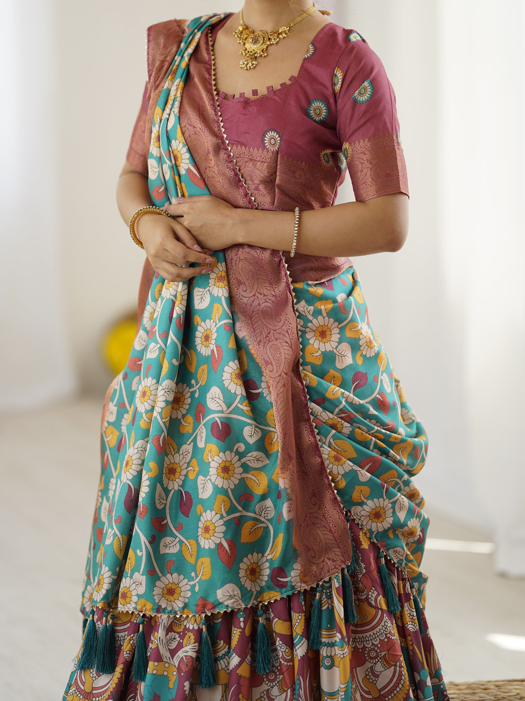 Wine & Turquoise Kalamkari Tussar Silk Lehenga with Floral Motifs, Zari Border & Tassel Dupatta – Wedding & Festive Wear
