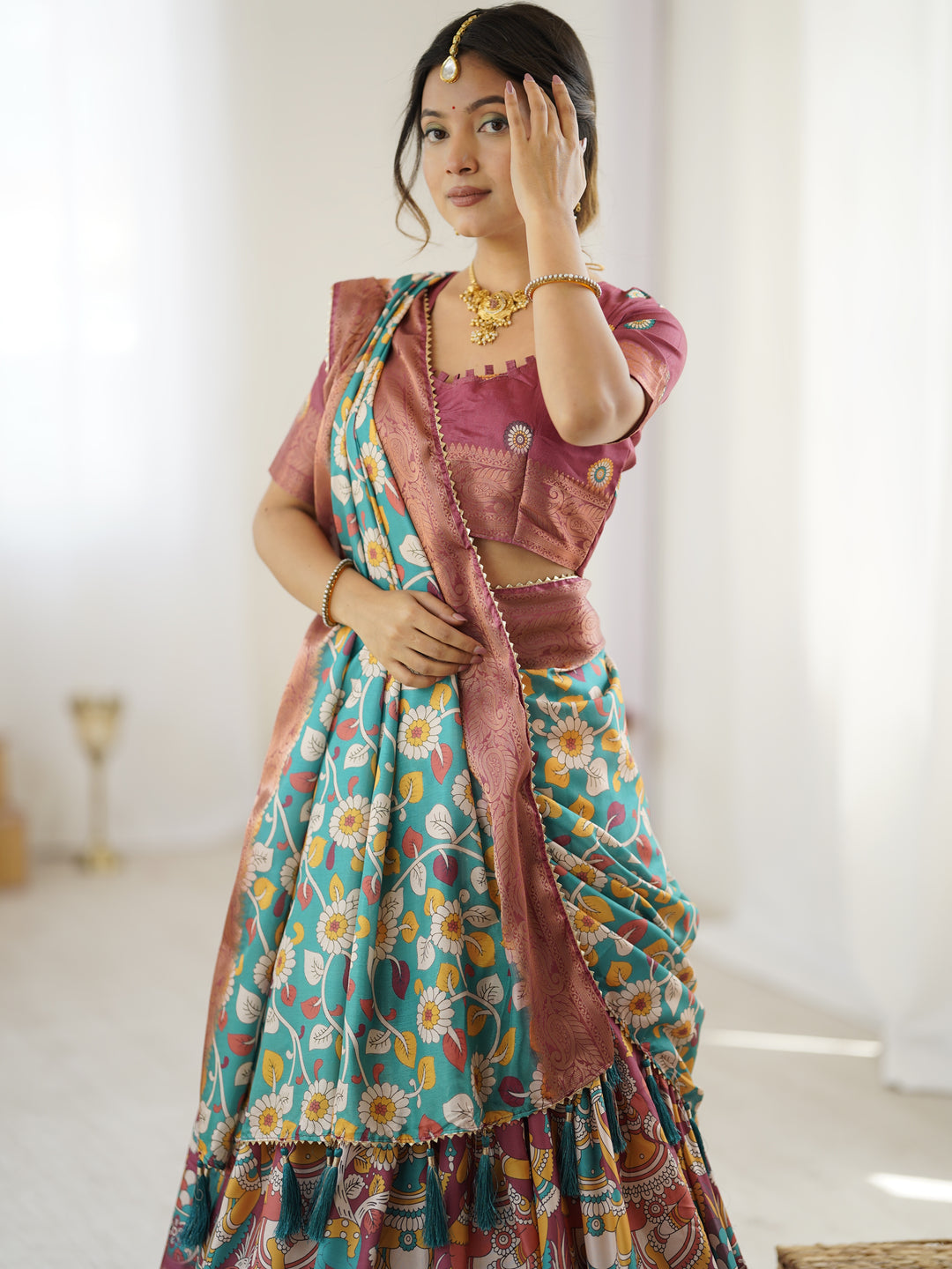 Wine & Turquoise Kalamkari Tussar Silk Lehenga with Floral Motifs, Zari Border & Tassel Dupatta – Wedding & Festive Wear