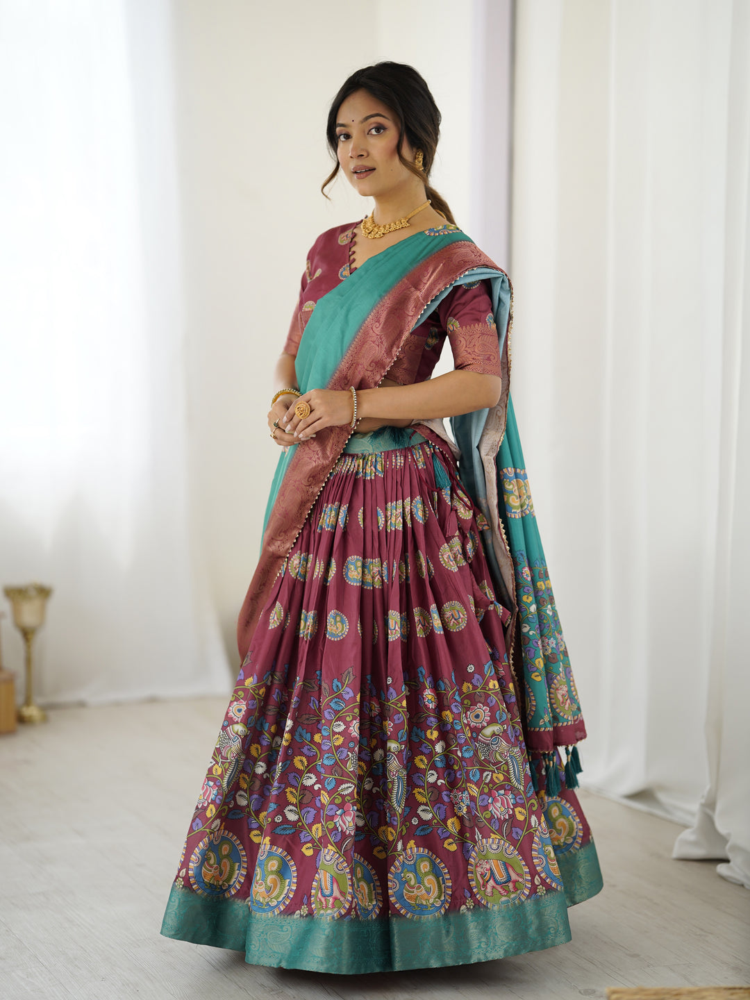 Wine & Teal Kalamkari Tussar Silk Lehenga with Zari Border & Tassel Dupatta – Festive & Wedding Wear