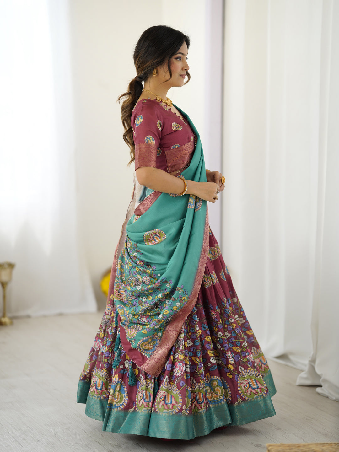Wine & Teal Kalamkari Tussar Silk Lehenga with Zari Border & Tassel Dupatta – Festive & Wedding Wear