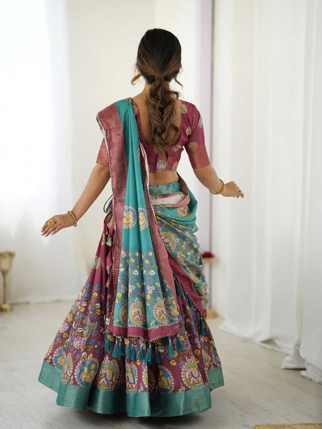 Wine & Teal Kalamkari Tussar Silk Lehenga with Zari Border & Tassel Dupatta – Festive & Wedding Wear
