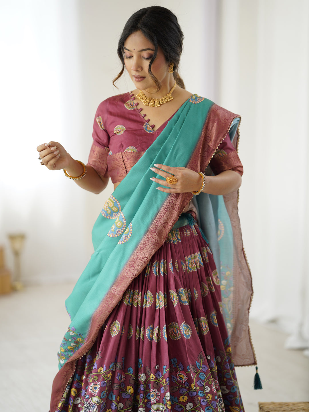 Wine & Teal Kalamkari Tussar Silk Lehenga with Zari Border & Tassel Dupatta – Festive & Wedding Wear